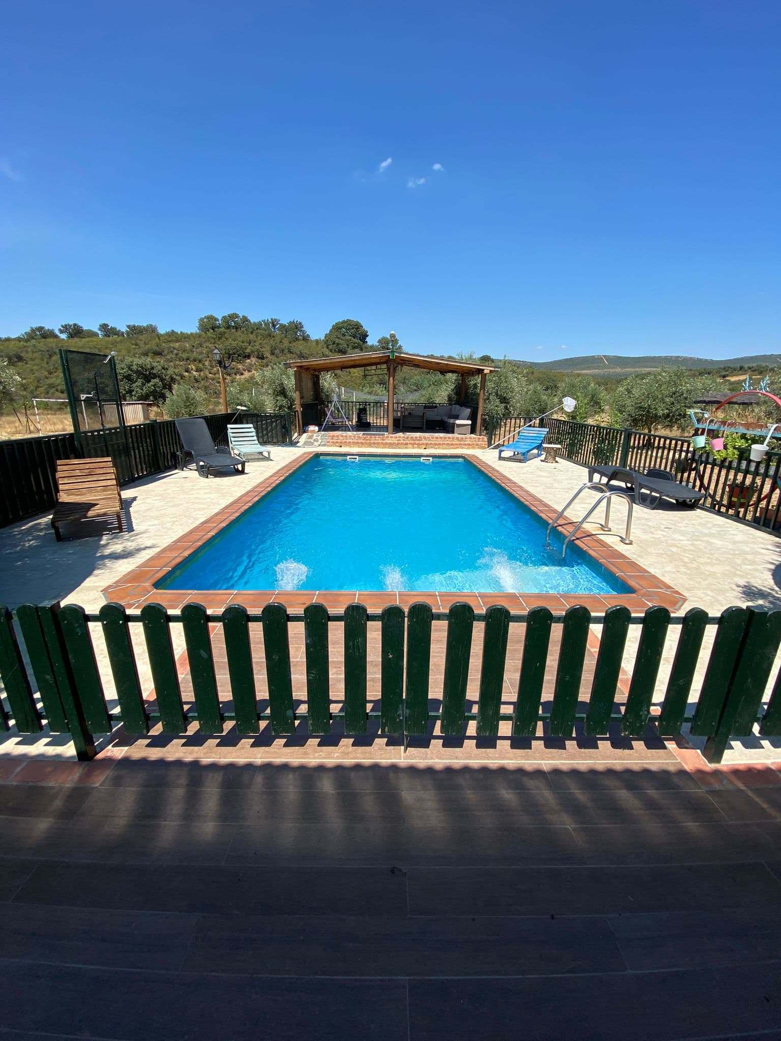 Piscina casa rural los rodeos